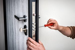 Locksmith repairing a broken lock mechanism in Chelsea and Belgravia