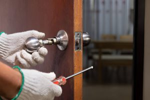 Local locksmith London working on a residential door in South Kensington