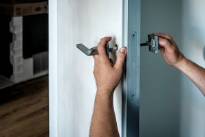 Locksmith near me fitting a replacement lock in Chelsea and Belgravia