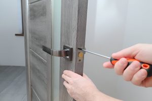 Locksmith London engineer with tools for a rapid response callout in Chelsea