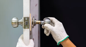Locksmith working on a period front door in Chelsea and Belgravia